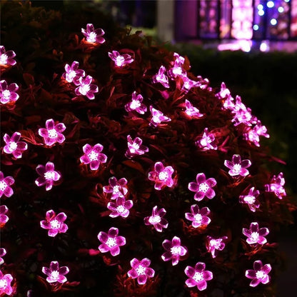 guirlande-solaire-extérieur-arbre-rose-fleurs
